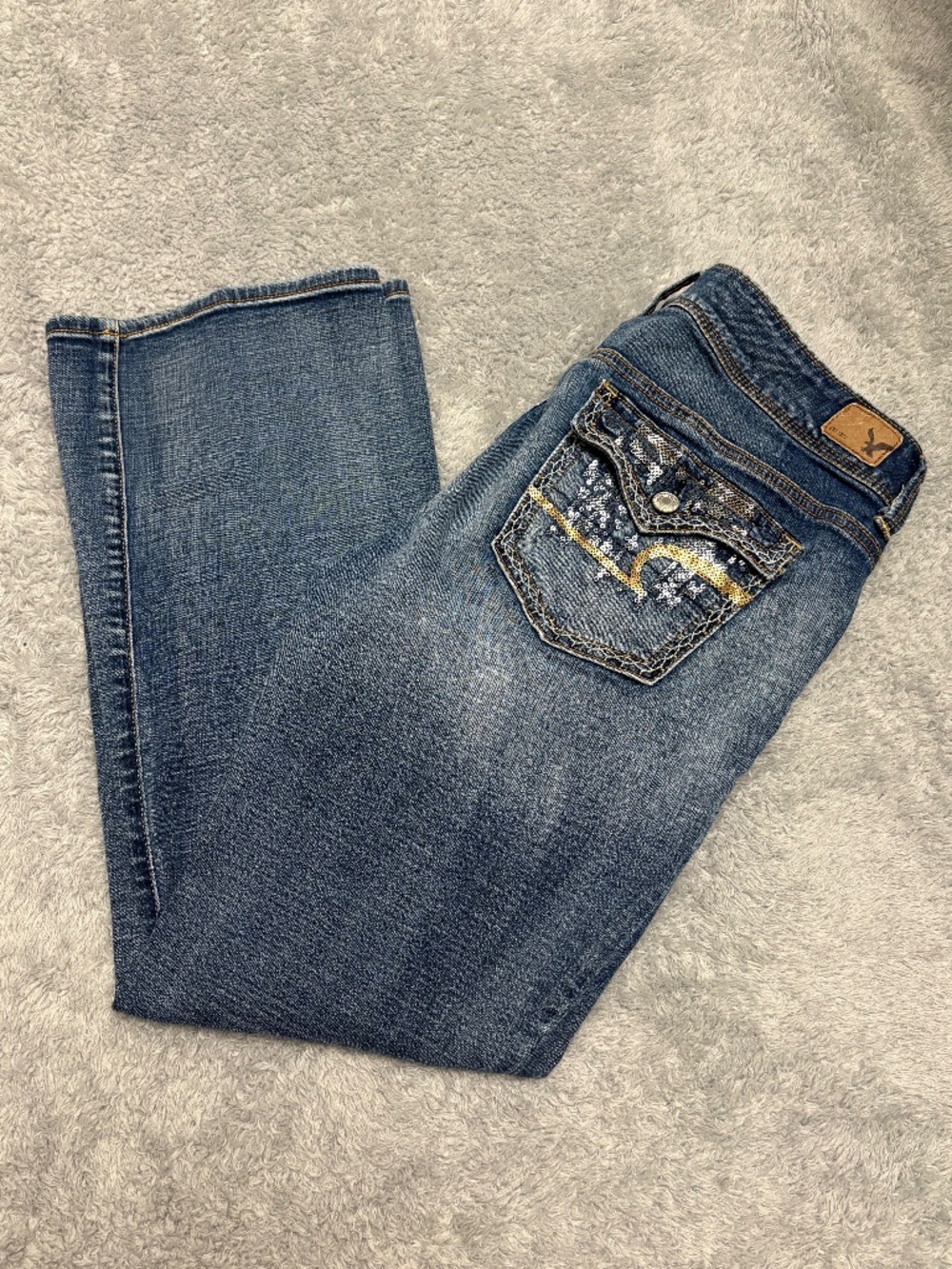 Women’s Blue Denim Jeans with Embroidered Back Pocket - Brand Unspecified